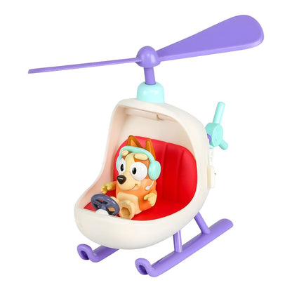 Figura do Bingo sentada aos comandos do helicóptero branco e lilás