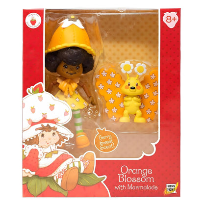 Boneca Strawberry Shortcake Orange Blossom na embalagem com a mascote borboleta Marmalade