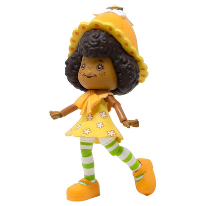 Boneca Strawberry Shortcake Orange Blossom com chapéu laranja e meias às riscas verdes