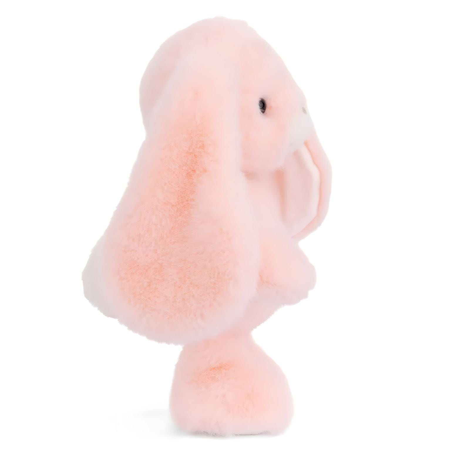 Coelho de peluche cor de pêssego com orelhas compridas, focinho creme e patas brancas