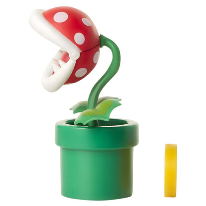 Figura Super Mario Planta Piranha com tubo verde, cabeça vermelha de pintas brancas e moeda amarela