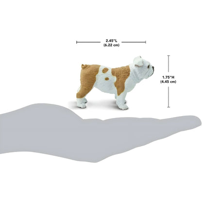 Figura de borracha Buldogue com dimensões sobre a palma da mão