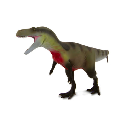 Figura de borracha Megalosaurus vista de frente, com a boca aberta e mancha vermelha