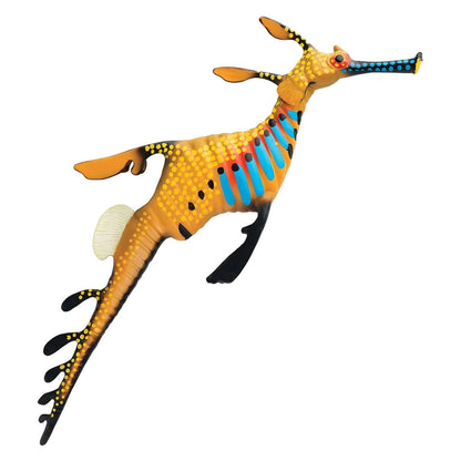 Figura de borracha Dragão marinho amarelo com pintas e riscas azuis