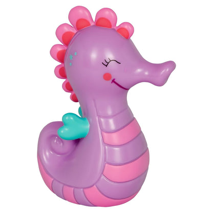 Mealheiro Cavalo Marinho Lilás da Spiegelburg em tons de lilás, rosa e turquesa, com expressão sorridente e ranhura para moedas