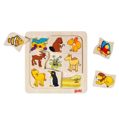 Puzzle madeira Onde vivo com peças de peixe, borboleta e leão fora do tabuleiro