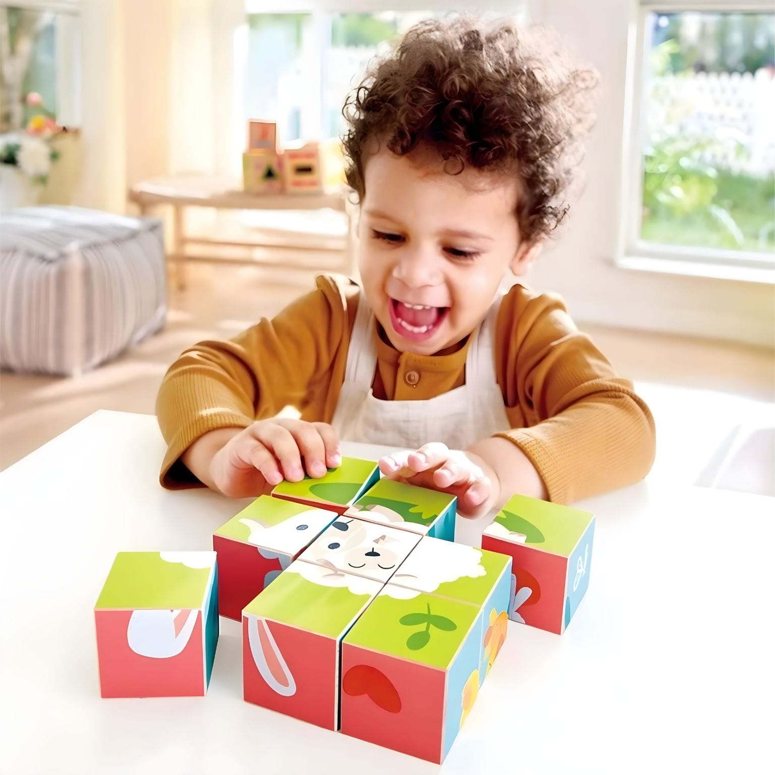 Cubos do Puzzle Animais da Quinta Hape para associação visual