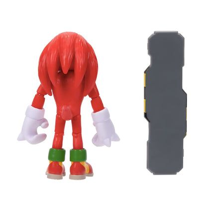 Costas da figura Knuckles e prancha de snowboard cinzenta
