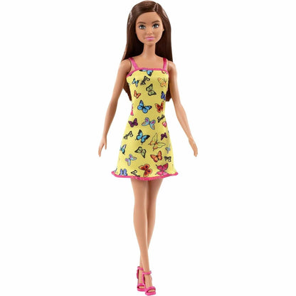 Barbie Fashion morena de pé, corpo inteiro, com os braços afastados