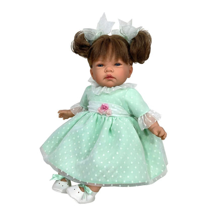 Boneca Célia Plumeti de vestido verde-água às pintas com flor