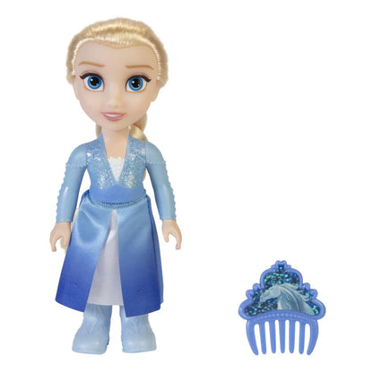 Boneca Elsa com vestido azul, vista de frente, ao lado do pente