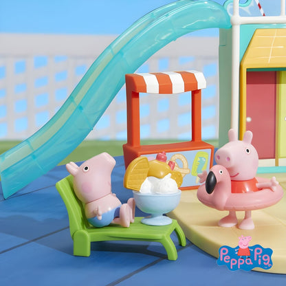 Figuras da Porquinha Peppa - Parque Aquático junto ao escorrega e à espreguiçadeira