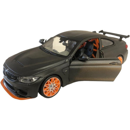 BMW M4 GTS cinzento mate com a porta aberta