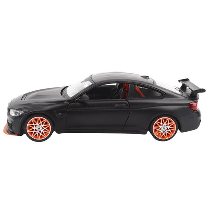 BMW M4 GTS cinzento mate visto de lado com asa traseira