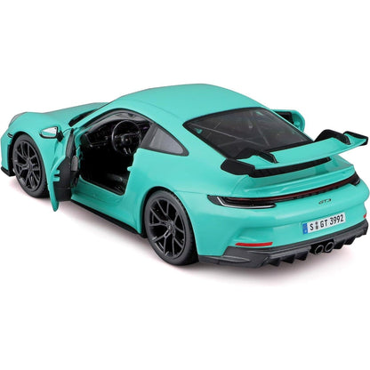 Porsche 911 GT3 2021 Menta verde em miniatura com porta aberta