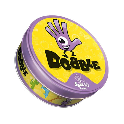 Lata redonda amarela e roxa do Jogo Dobble com mão de olho no centro