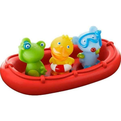 Barco vermelho com as figuras sapo, pato e elefante