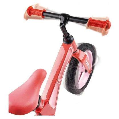 Pormenor do guiador e da roda dianteira da Bicicleta de Equilíbrio Rosa
