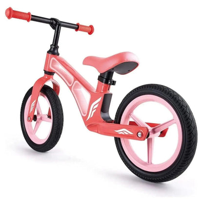 Bicicleta de Equilíbrio Rosa vista de frente em diagonal com guiador de punhos rosa