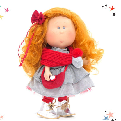 Boneca Mia com laço vermelho e mala vermelha em fundo com estrelas
