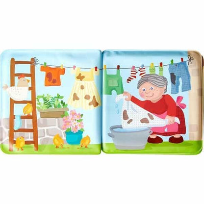 Livro de Banho Quinta aberto com estendal e avó a lavar roupa