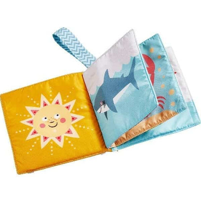 Páginas do Livro de Tecido Mundo Marinho com sol sorridente e tubarão