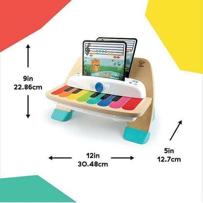 Piano Mágico com medidas de 22,86 cm de altura, 30,48 cm de largura e 12,7 cm