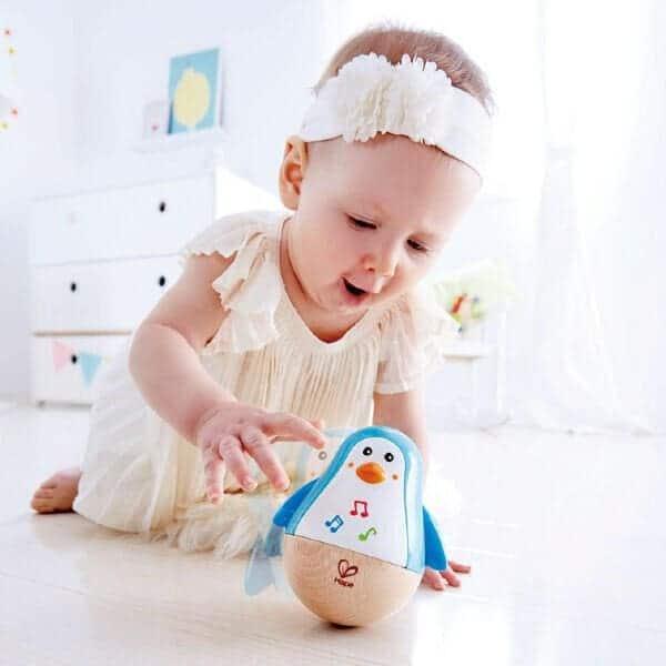 Apresentamos Pinguim Musical sempre em pé com o SKU 82033123 recomendado para + 6 meses