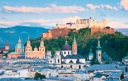 Imagem do Puzzle Salzburgo com a cidade, igrejas e fortaleza no monte