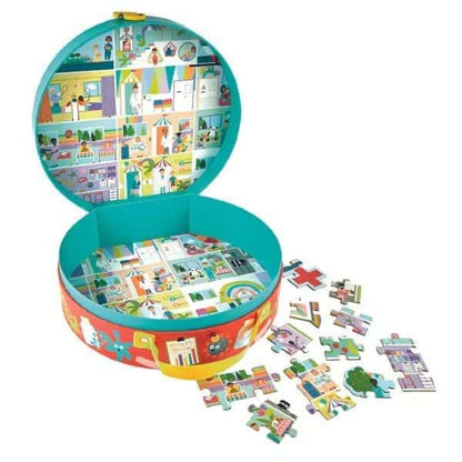 Caixa aberta do Puzzle Hospital 100 pçs com peças soltas